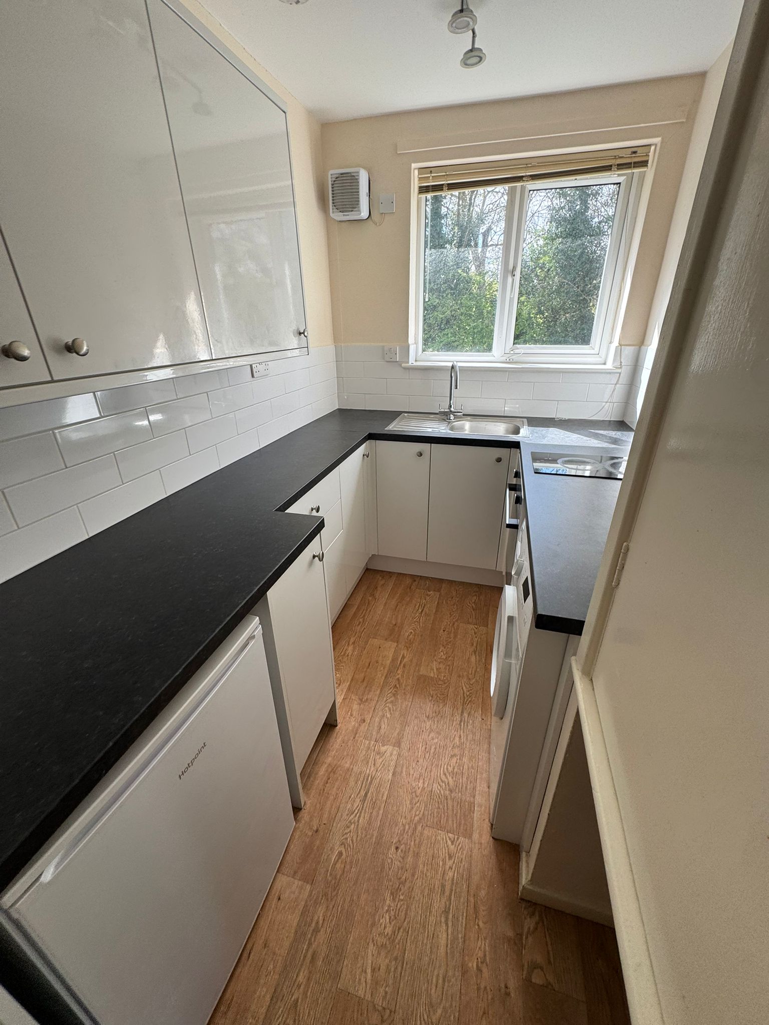 Navy blue kitchen cleaned to showroom finish